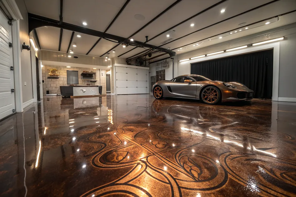 Luxury garage featuring a metallic epoxy floor finish with a marbled effect