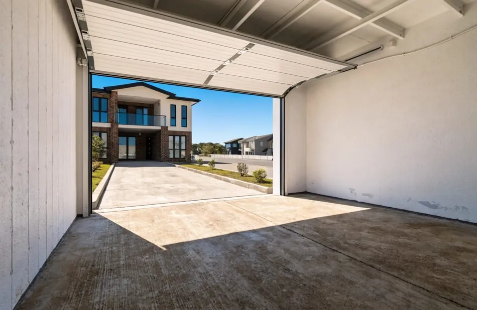 Uncoated concrete garage slab in a new estate home, ready for epoxy coating